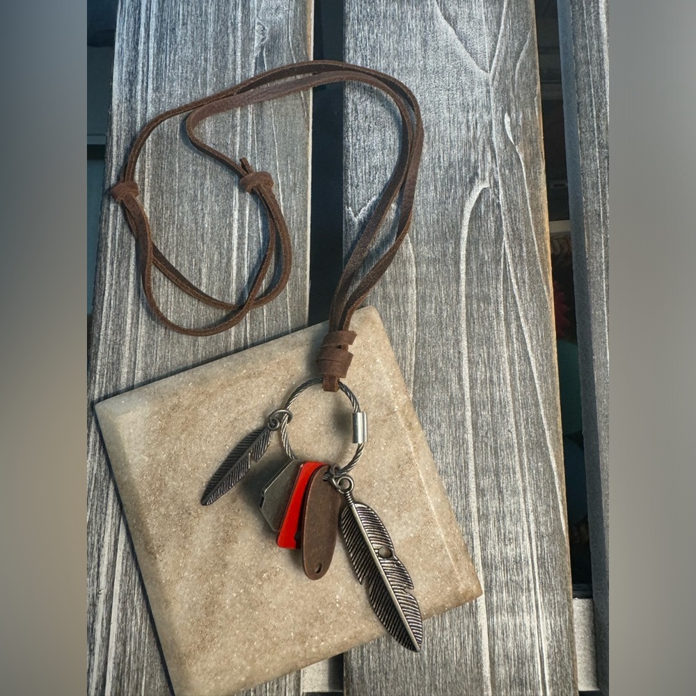 Feather charm necklace